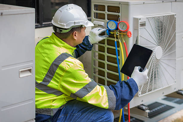 Professional Air Duct Cleaning technician working in Williamsburg, IN